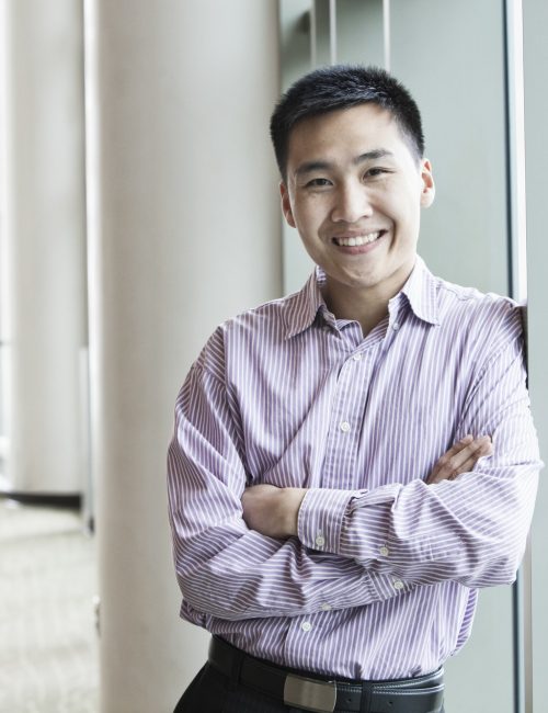 Asian businessman in a business center lobby.