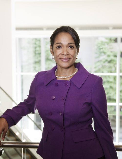 Black businesswoman in lobby of large business center