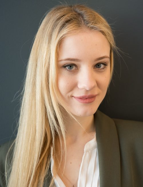 Gorgeous female portrait posing in business suit